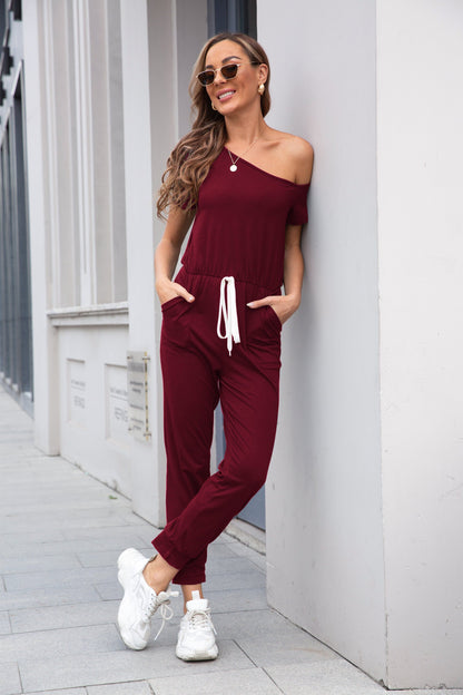 One Shoulder Short Sleeve Drawstring Pockets Straight Leg Solid Loose Fit Jumpsuit